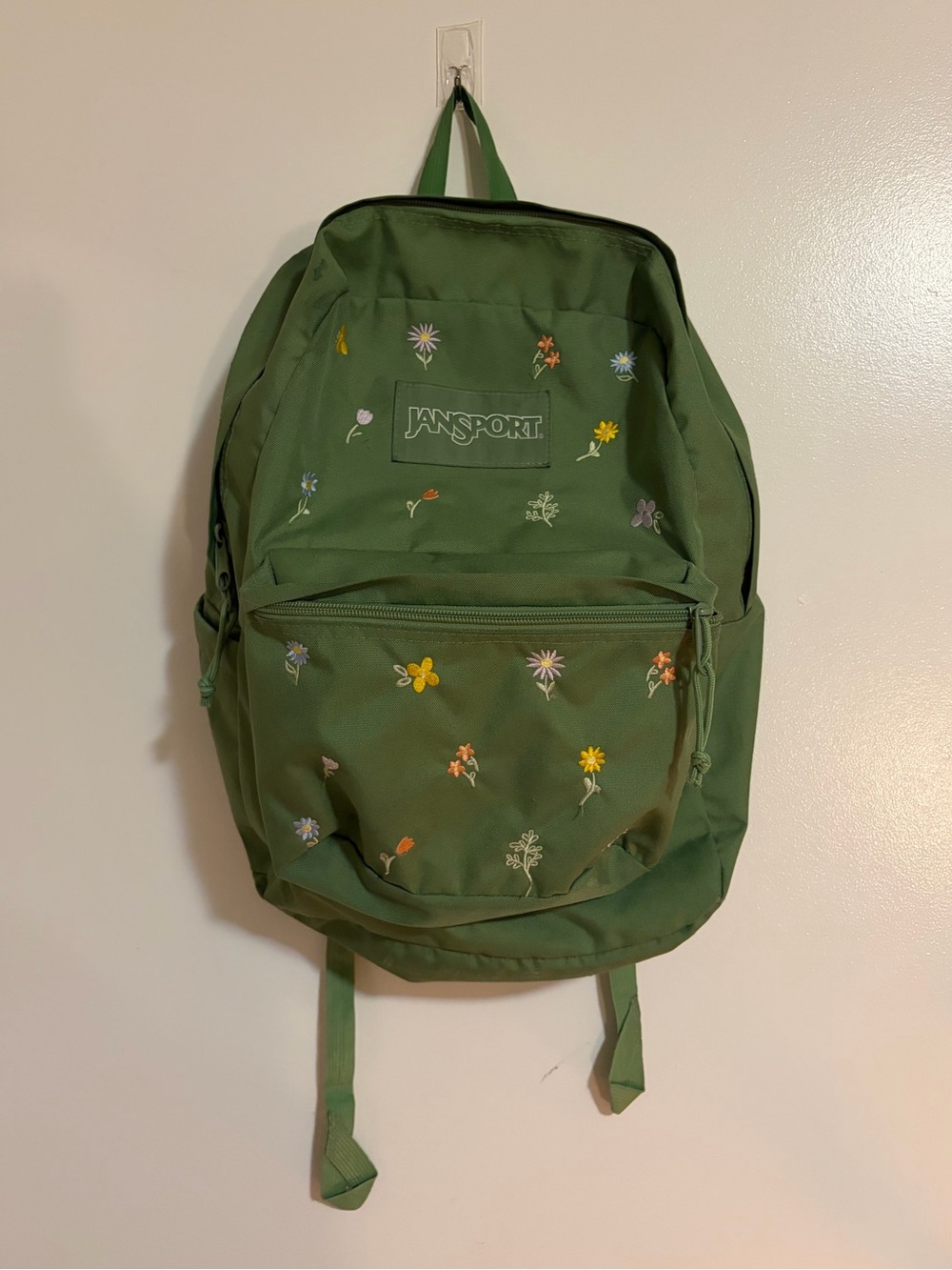 JanSport super break plus green floral backpack